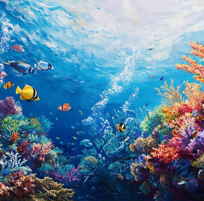 A vibrant coral reef with diverse marine life, including colorful fish and corals, under clear blue water, symbolizing the beauty and importance of coral reef protection.